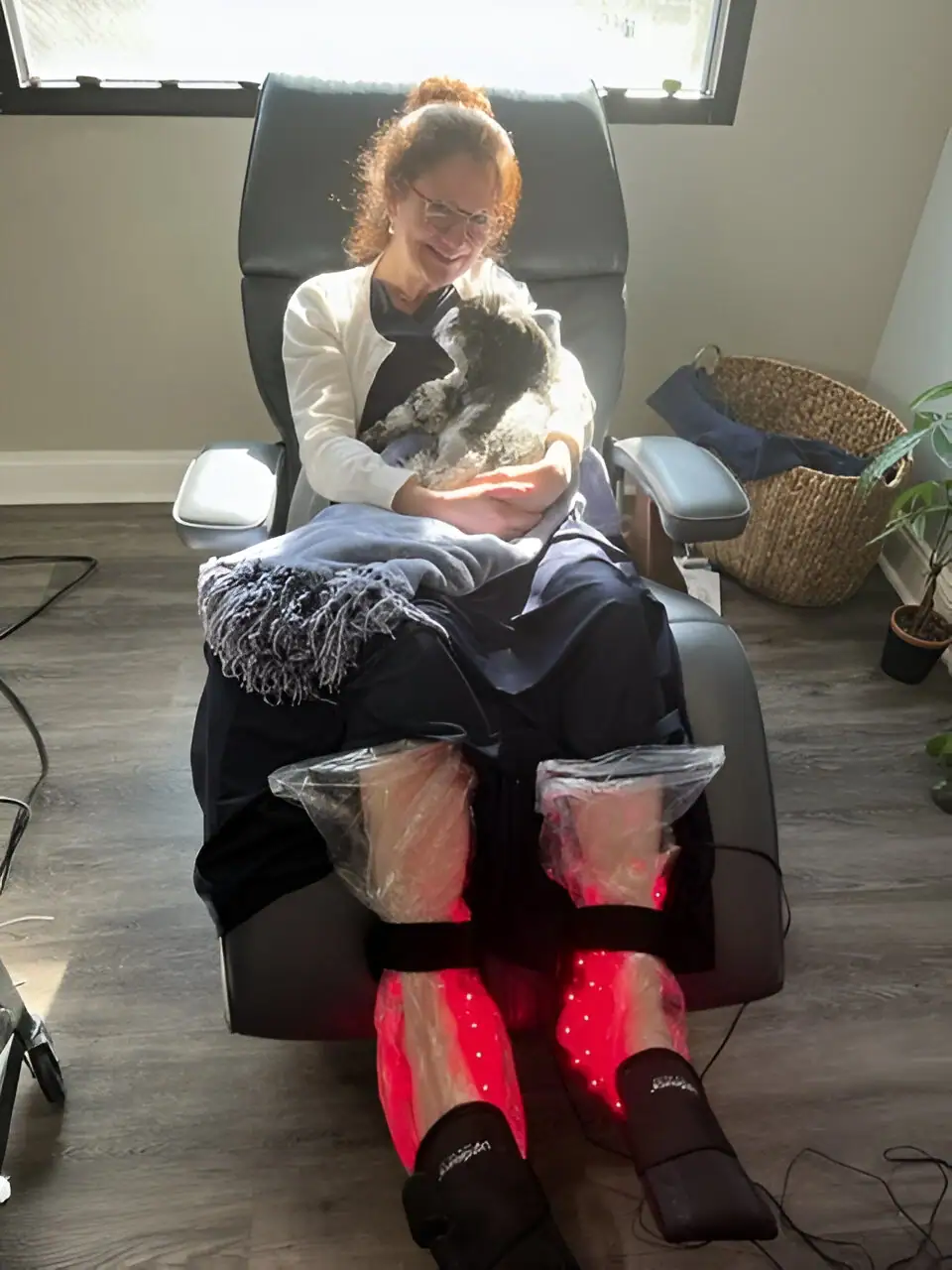 Patient with a dog receiving neuropathy treatment in Roanoke